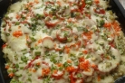 Свинина по-французски с помидорами и картошкой