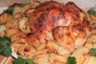 Курица, фаршированная картофелем