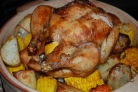 Курица, запеченная целиком с овощами