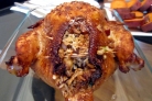 Курица, фаршированная рисом, в духовке