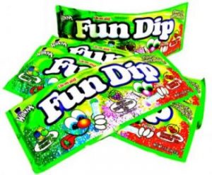 Packages of Fun Dip, candy sticks dipped in sugar, by Wonka candies.